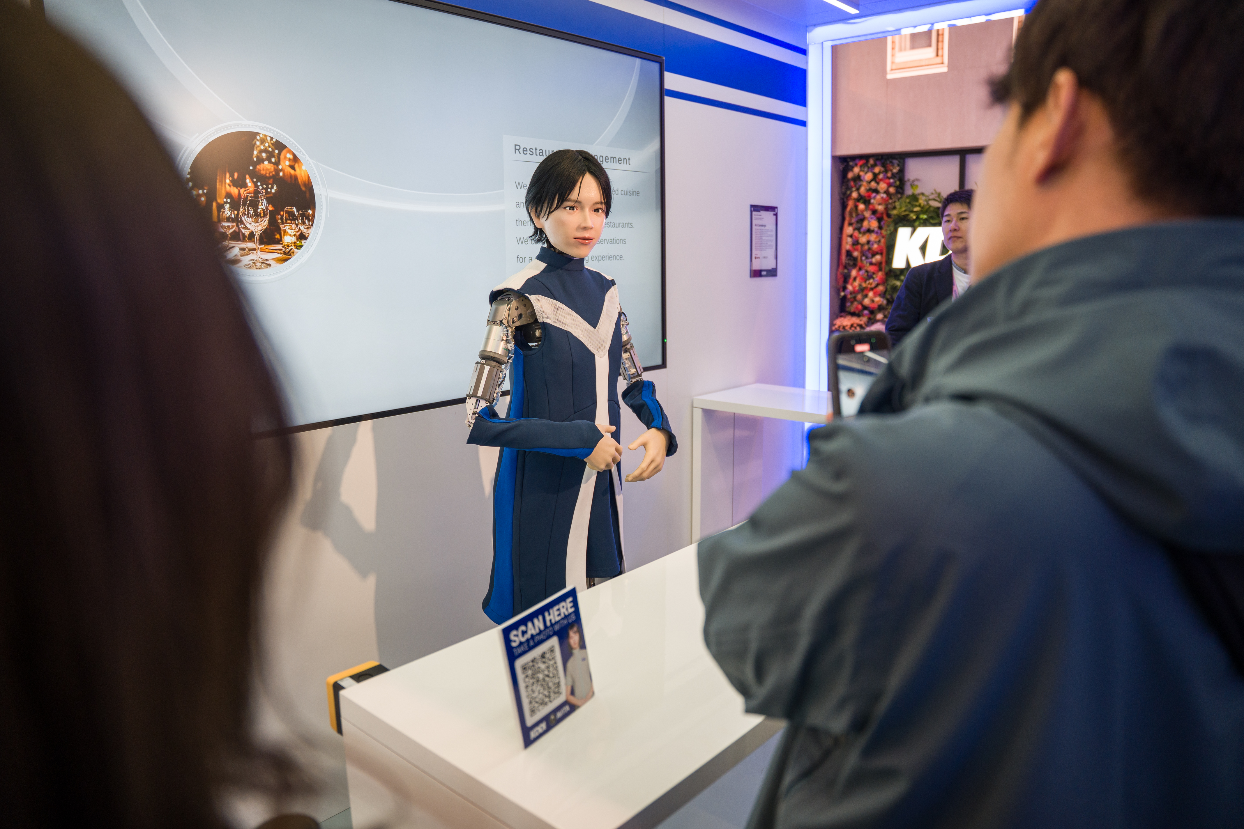 A humanoid robot with a very human appearance at MWC