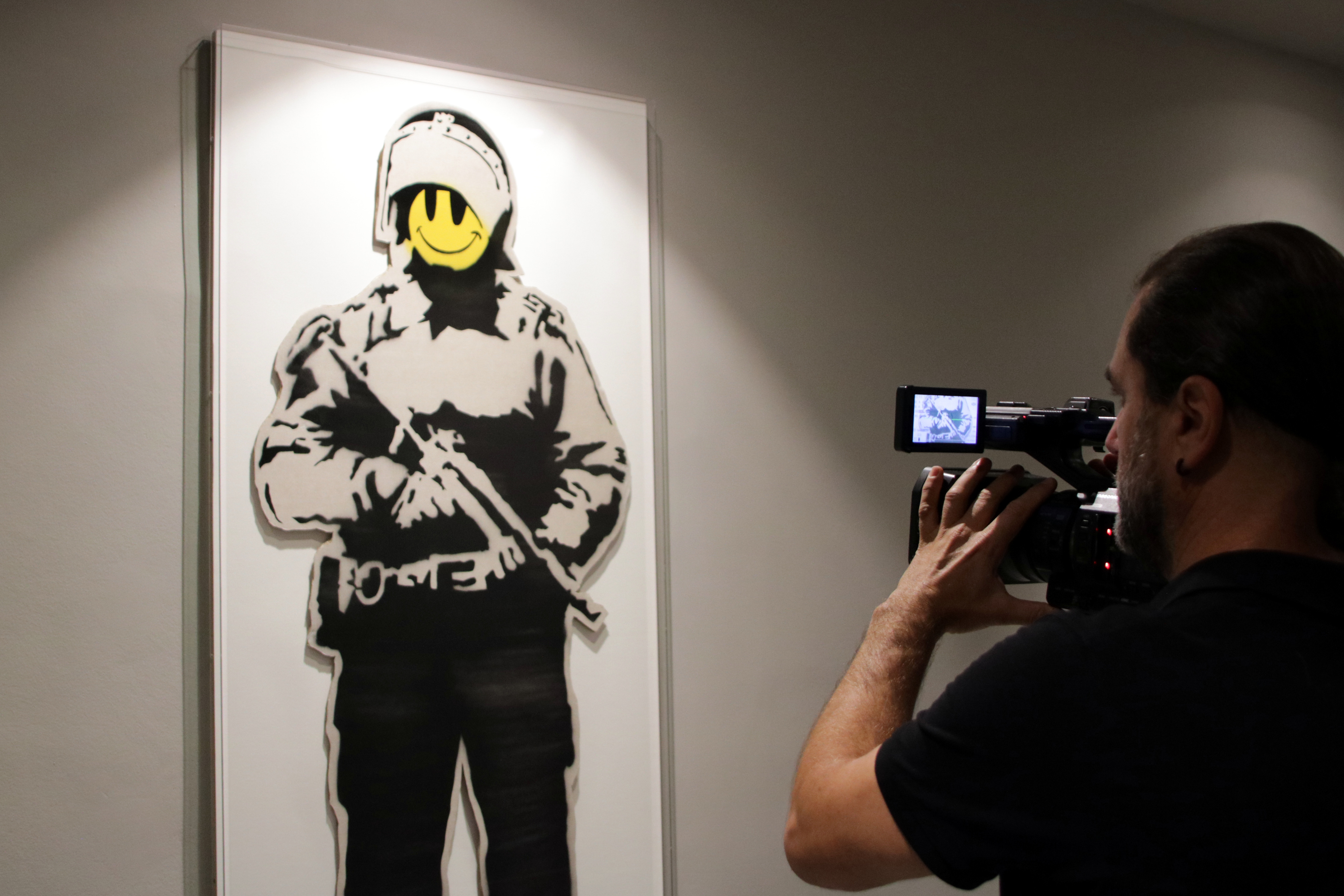 'Smiling Copper' by Banksy, at Barcelona's Museu de l’Art Prohibit