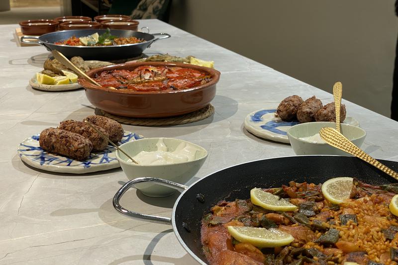 Vegan versions of traditional recipes, including paella and fideuà ready to be served at In Bloom Cooking School