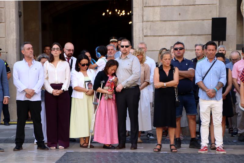 Relatives of victims of the 2017 terror attack during the minute of silence in Plaça Sant Jaume, Barcelona