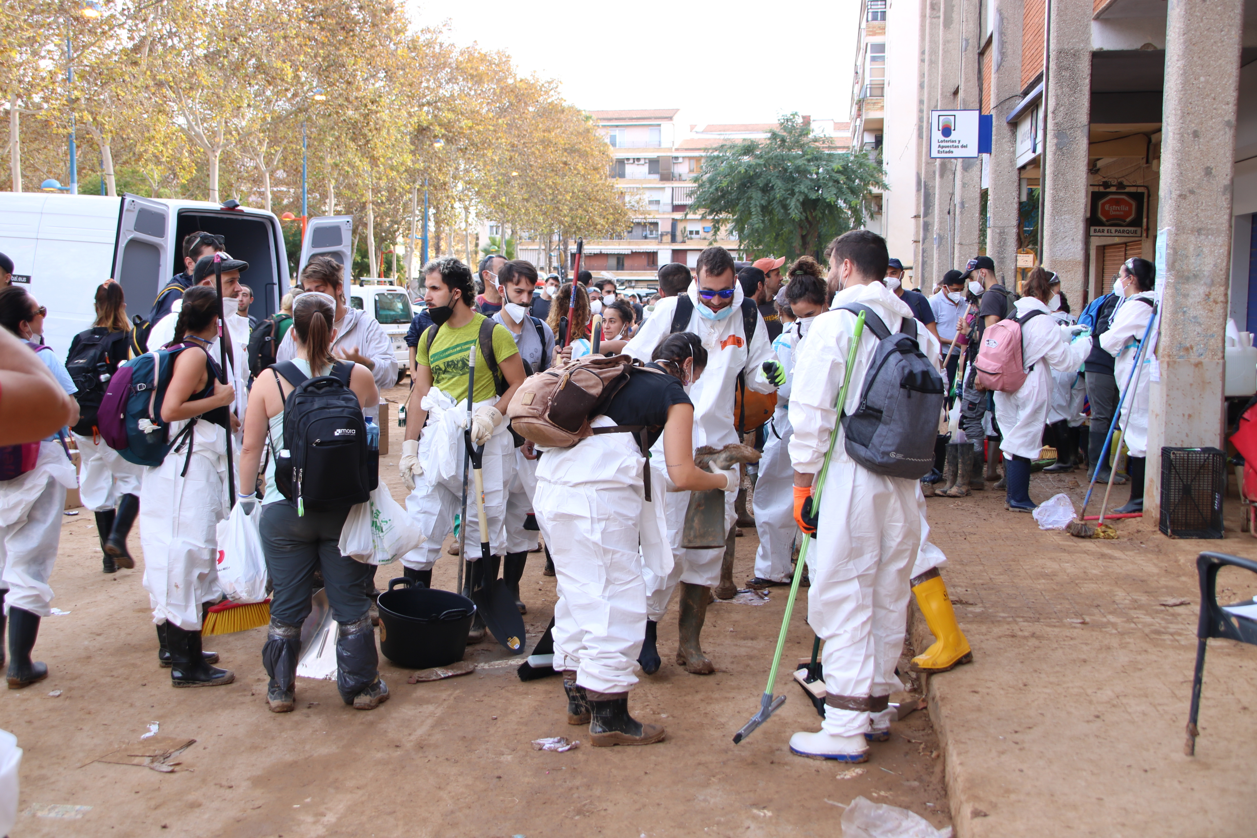 Volunteers preparing themselves to clean the neighborhood of Parc Alcosa in the Valencian municipality of Alfafar, one of the most affected by the floods