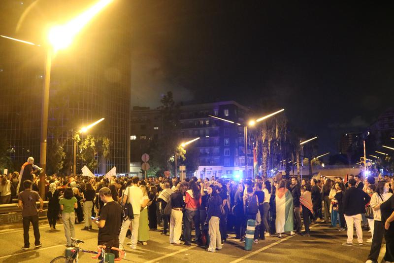 Dozens of Barcelona residents demonstrate outside of the Israeli consulate in Barcelona on October 1, 2025, after the flotilla heading to Gaza was intercepted