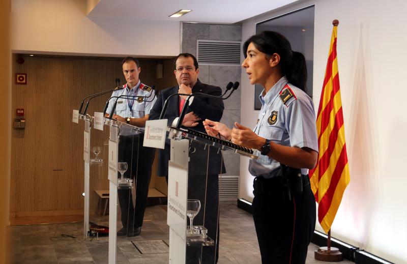 Catalan Mossos d'Esquadra police spokesperson Montserrat Escudé besides interior minister Joan Ignasi Elena, and head of police Eduard Sallent during a press conference on November 3, 2022