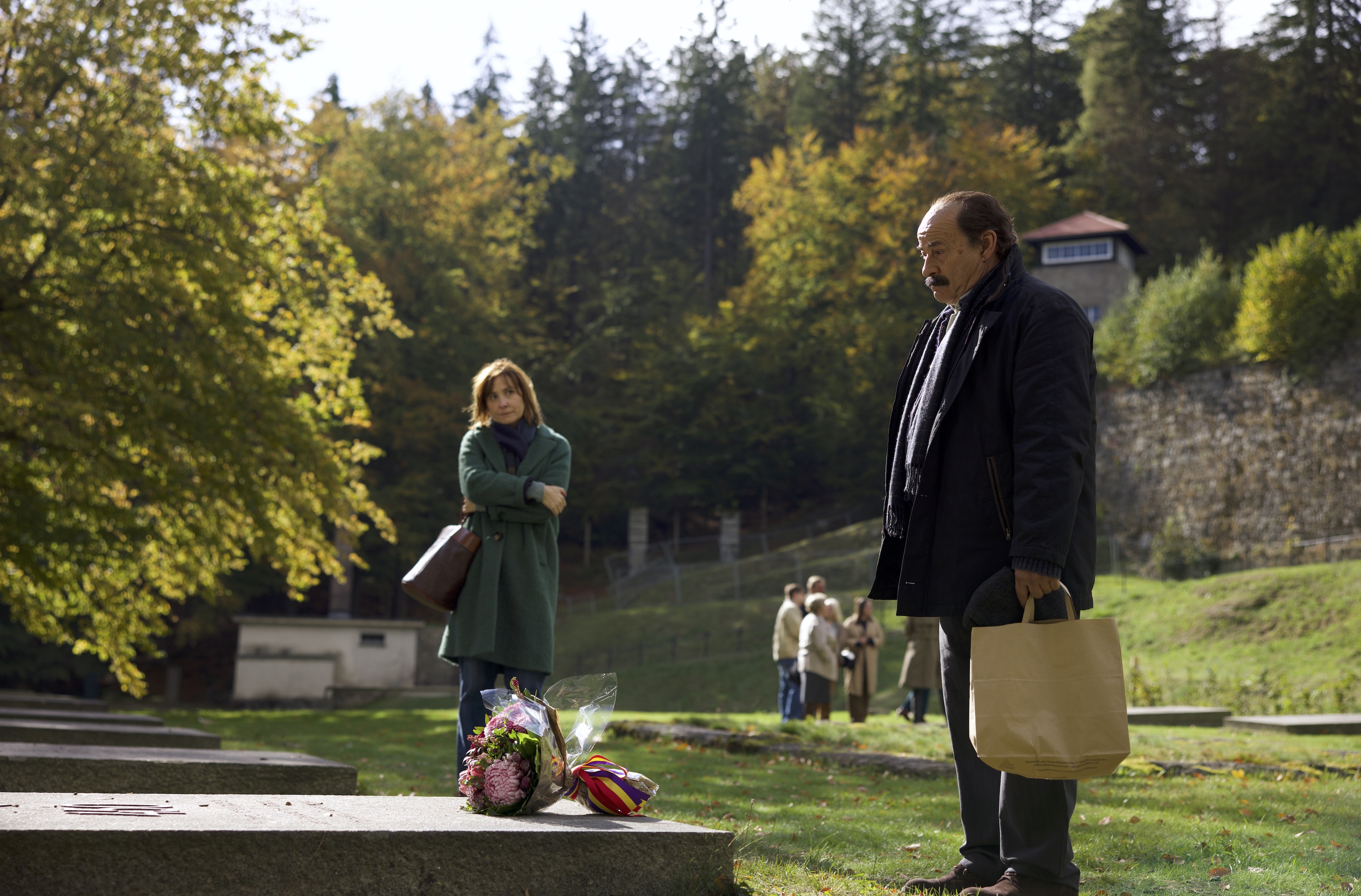 A shot from the film 'Marco' (2024), a fictionalized biopic about the life of Enric Marco, depicting the main character visiting the Flossenbürg concentration camp