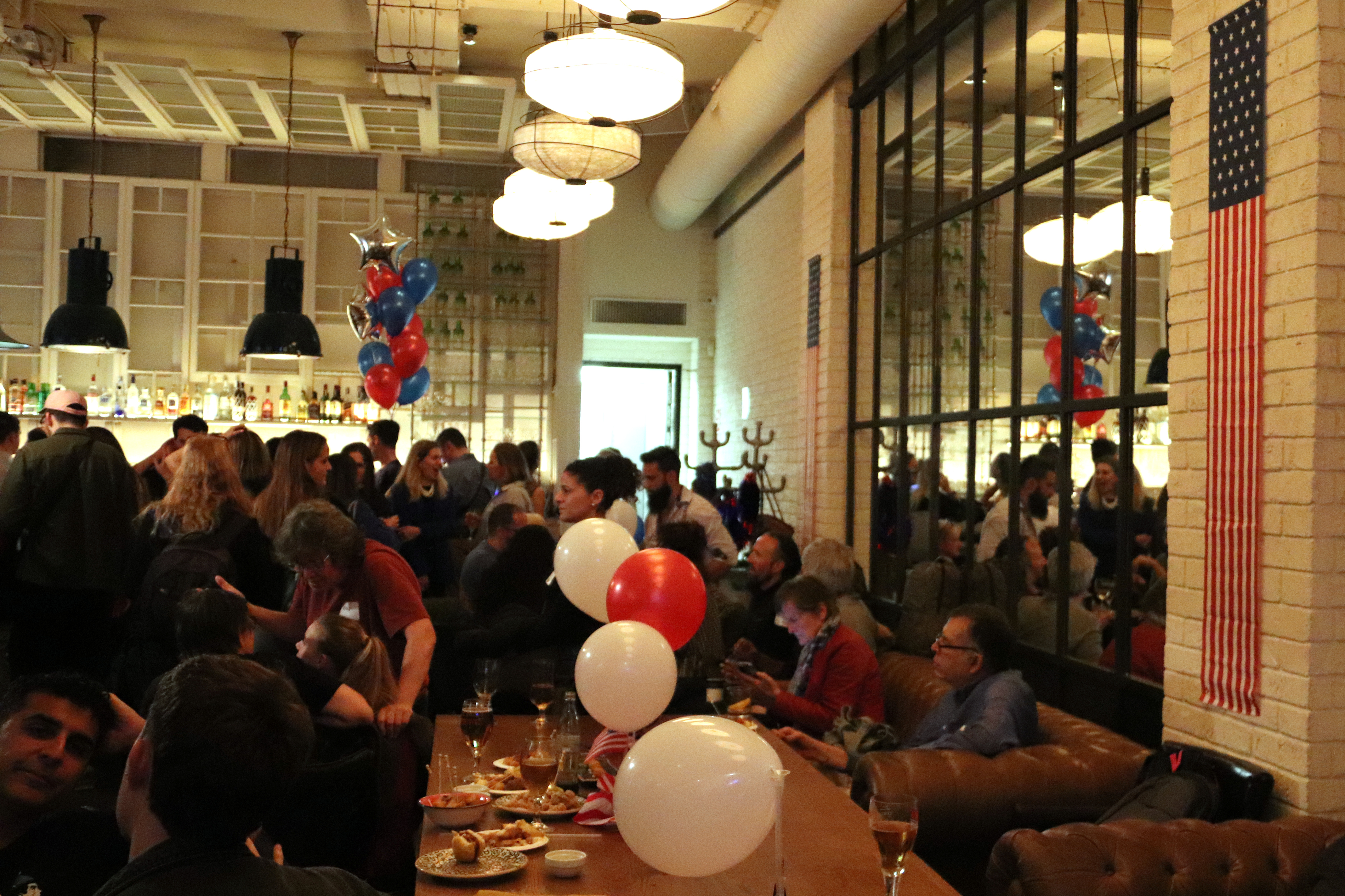 Around 300 people gathered to follow the US national election results in Barcelona city center on November 5, 2024