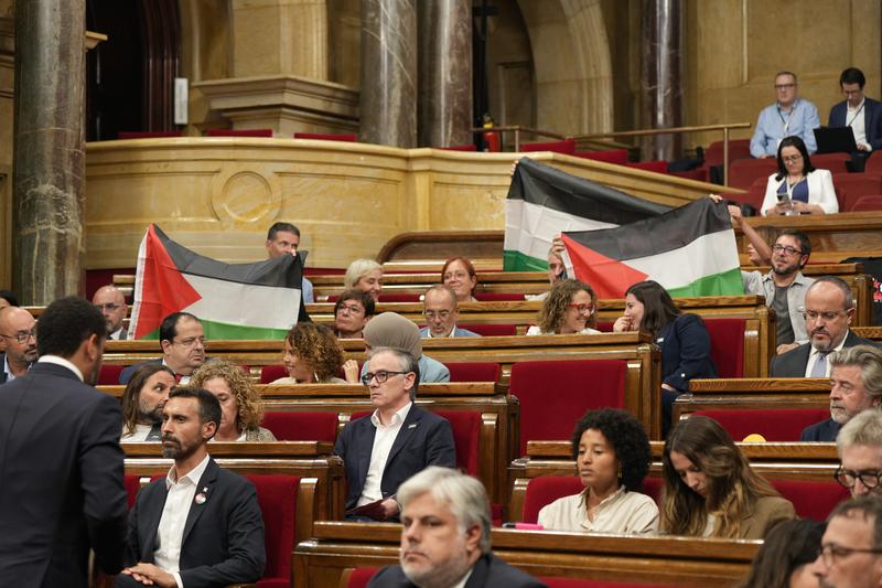 Three Palestinian flags after the Catalan parliament held a minute's silence on September 30, 2025