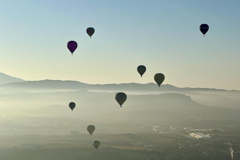 Hot air balloons flying over Igualada during the 2024 European Balloon Festival on July 11, 2024