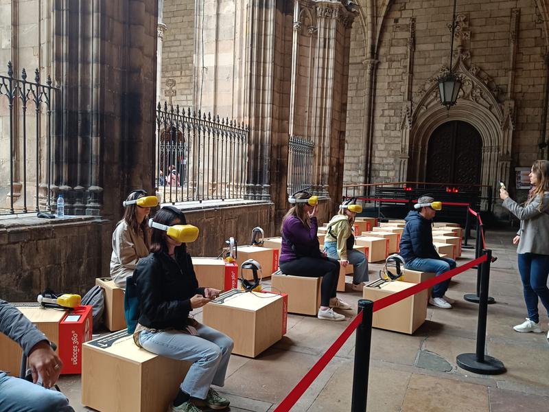 Visitors trying the new virtual reality tour in Barcelona's Cathedral