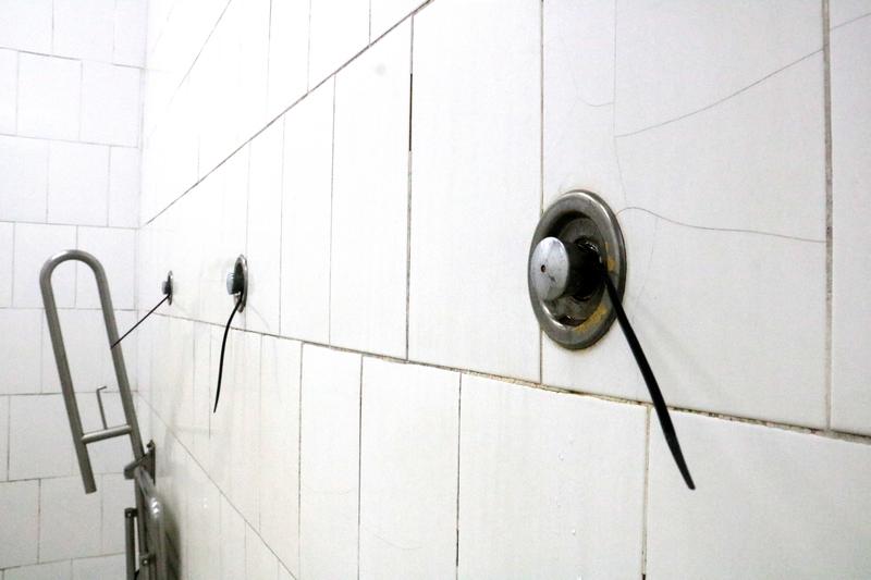 Closed showers in a sports facility.