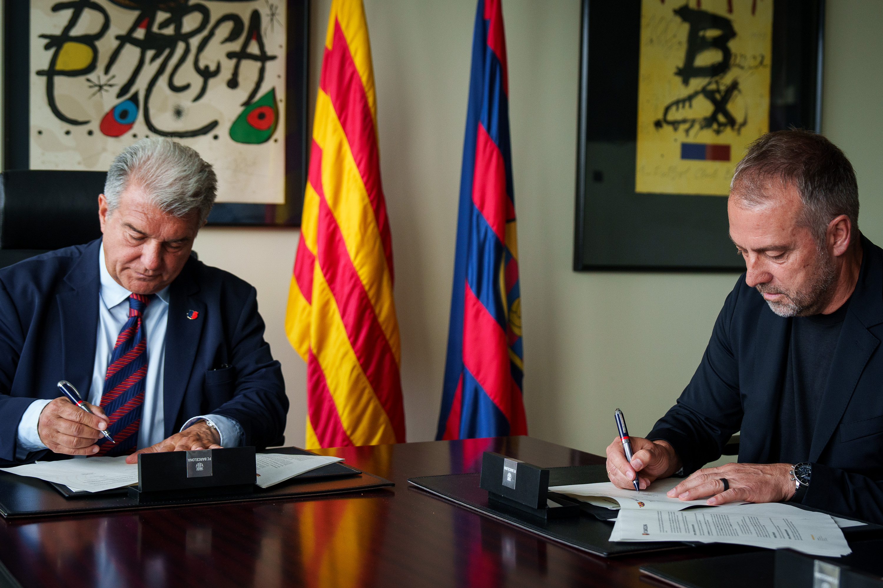 FC Barcelona president and head coach Hansi Flick sign a contract extension until 2027