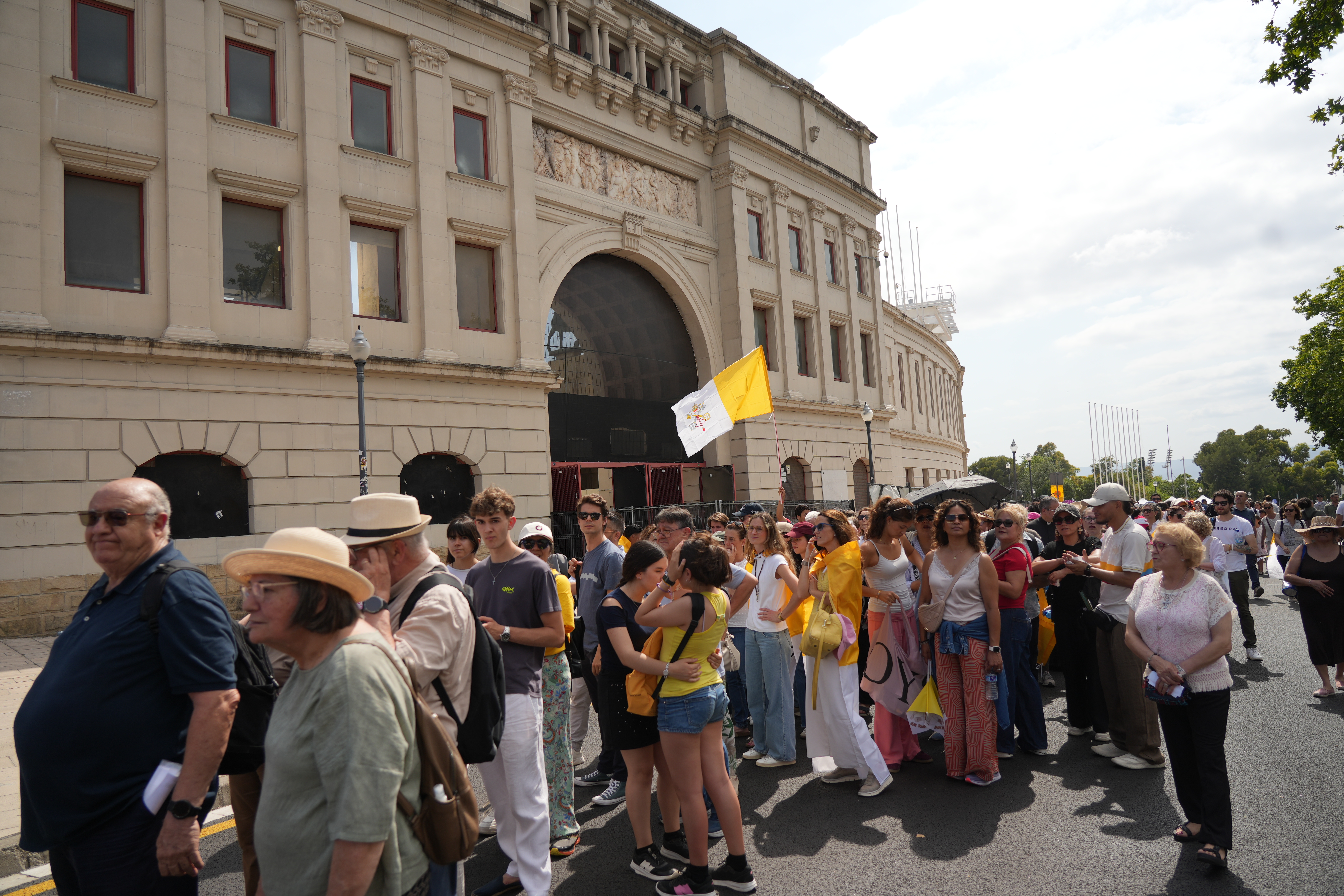 Dozens of people near the Olympic Stadium as they await the Pope's arrival