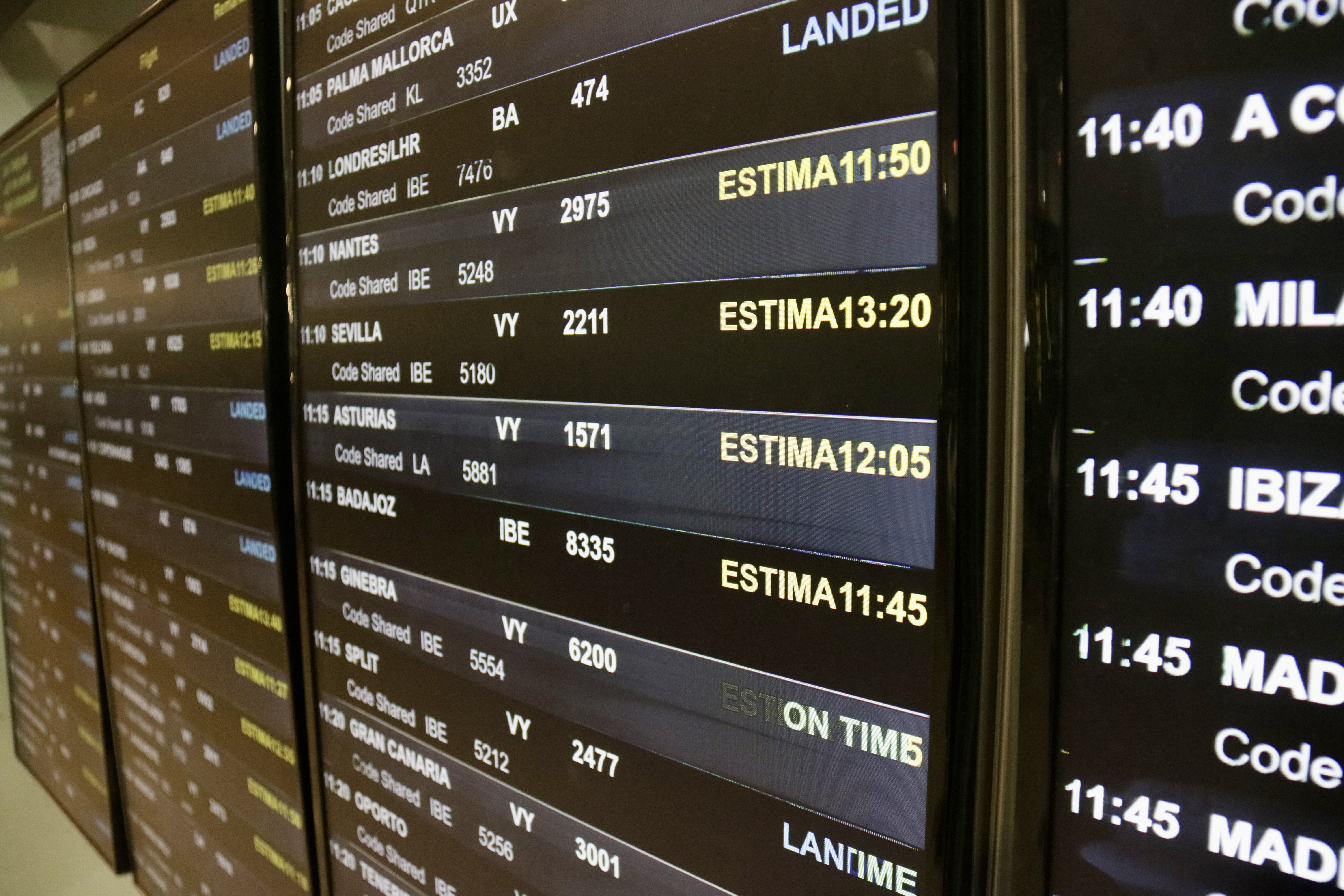 Barcelona airport information screens with some flights delayed due to a global IT issue on July 19, 2024