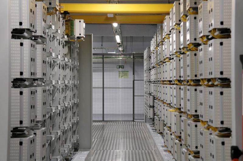 The 'meet-me room' (MMR) of an Equinix data center, an interconnection room where different telecommunications operators, internet providers and customers physically connect their networks to exchange data traffic
