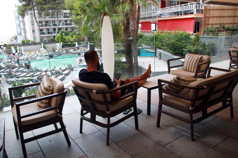 A tourist relaxes in a hotel in Salou