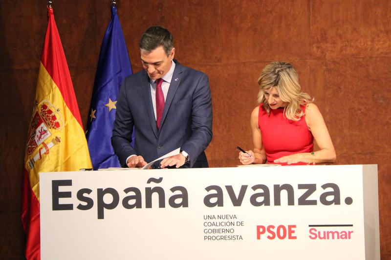 Leaders of the Socialists and Sumar, Pedro Sánchez and Yolanda Díaz, sign a new coalition agreement in the Reina Sofía Museum in Madrid