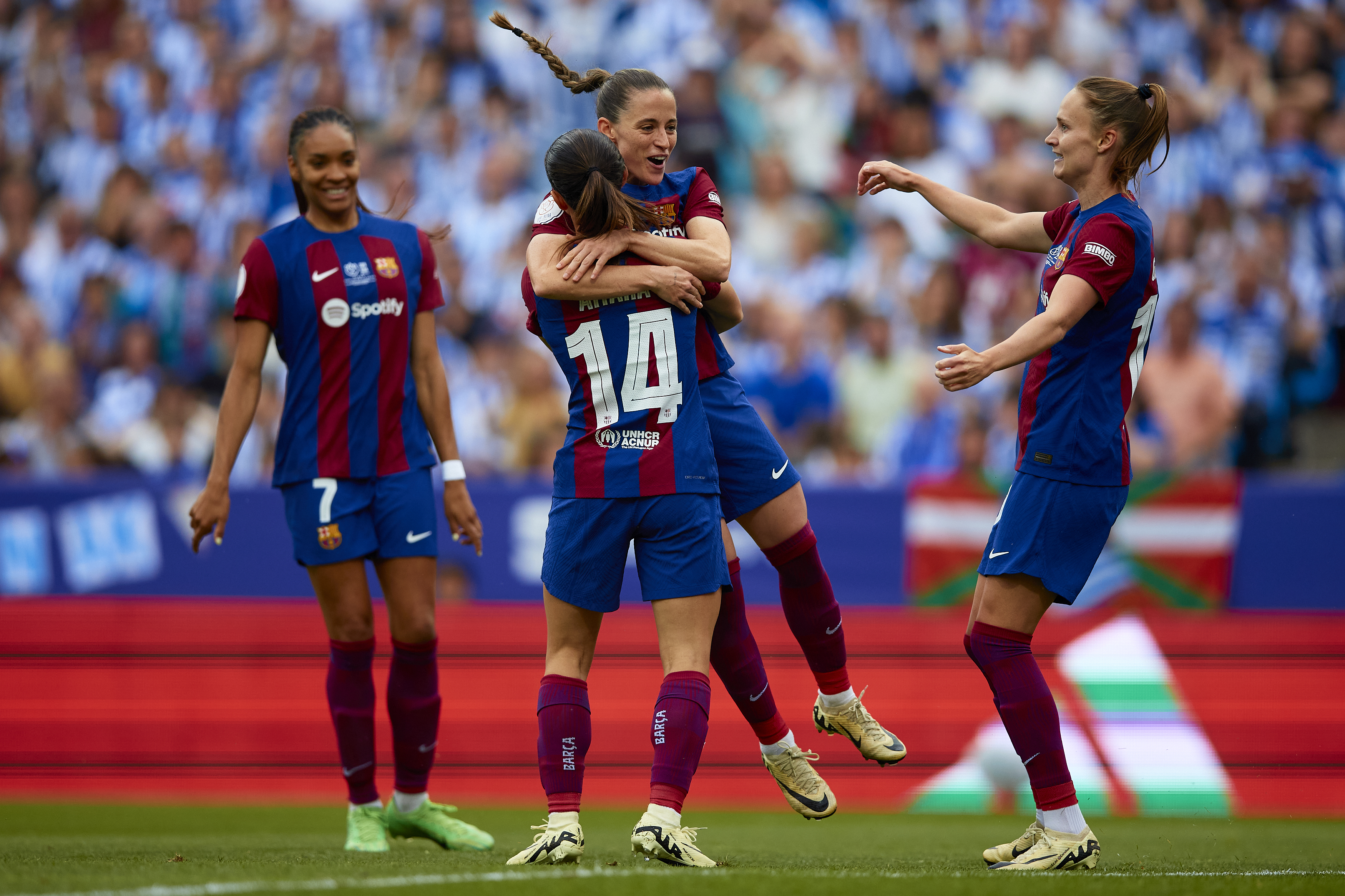 Barça Femení players celebrate scoring in the Copa de la Reina final 2024