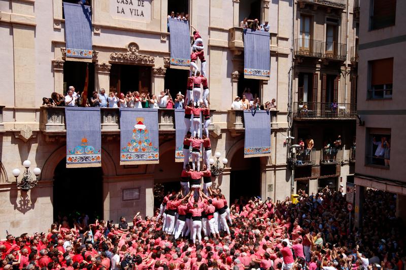 'Castellers' human towers create a 3-of-9 tower in Valls on the celebration day of Sant Joan, June 24, 2023