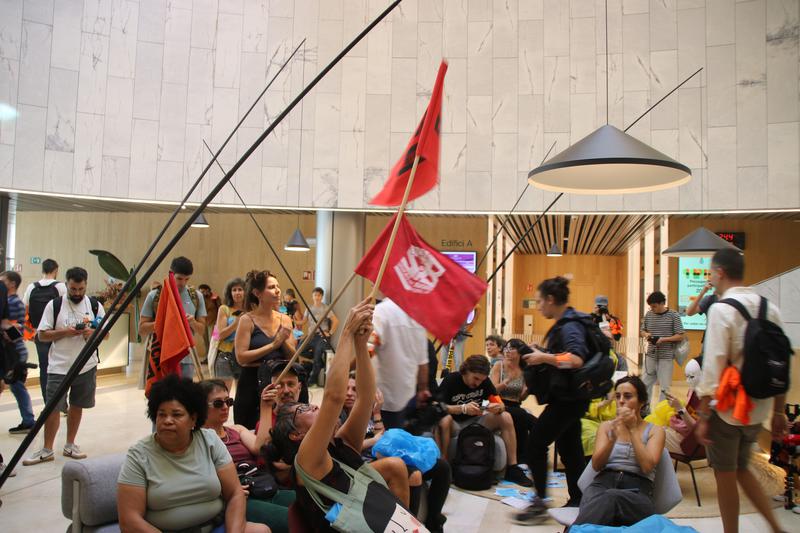 Protesters enter the Catalan government's Administrative District offices