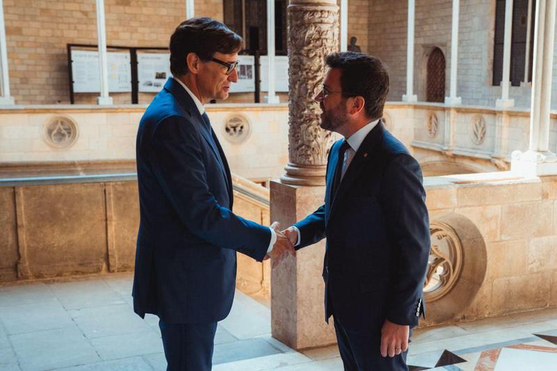 Newly appointed Catalan president Salvador Illa and outgoing president Pere Aragonès.