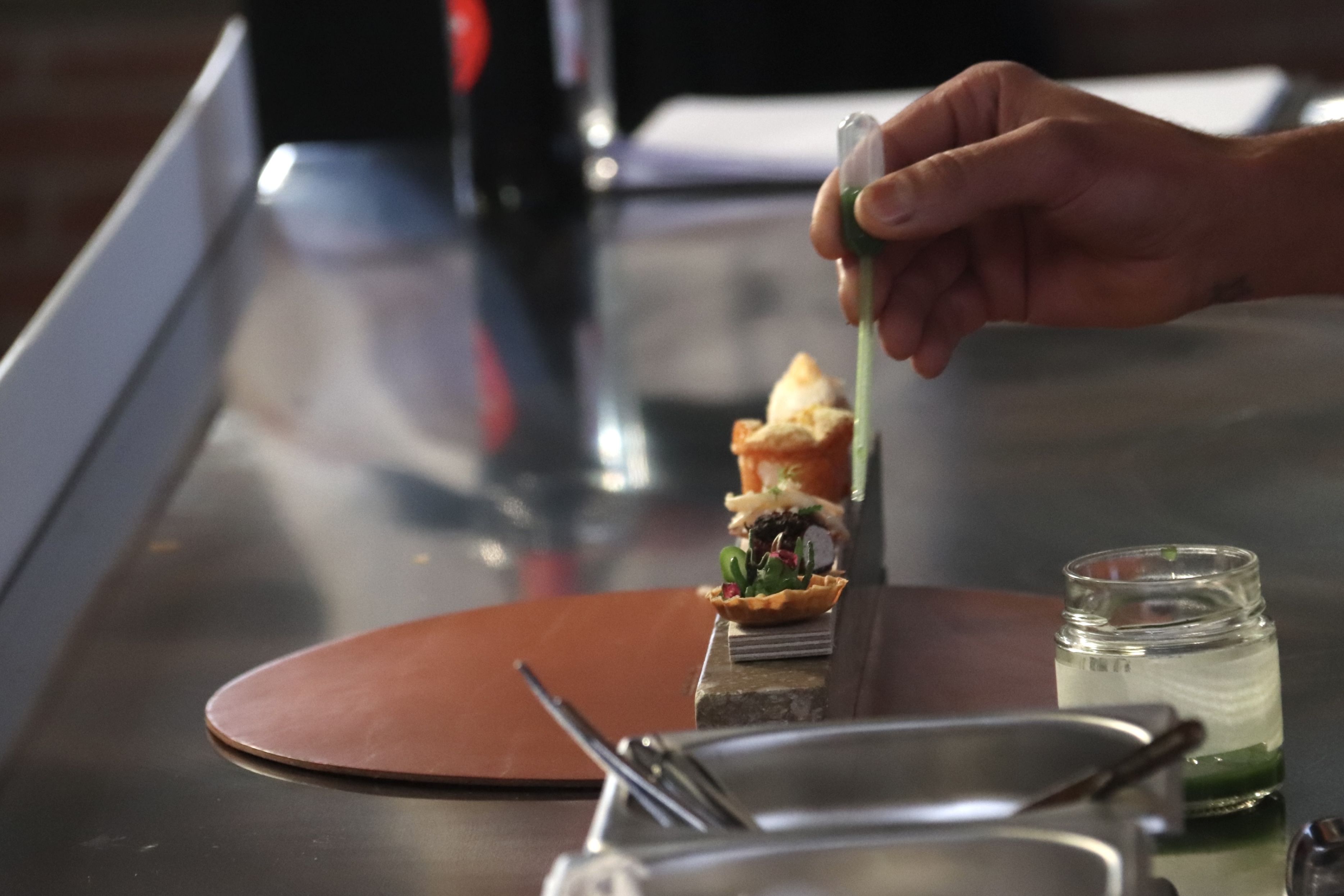 Chef Joan Roca prepares one of the appetizers served at Celler de Can Roca