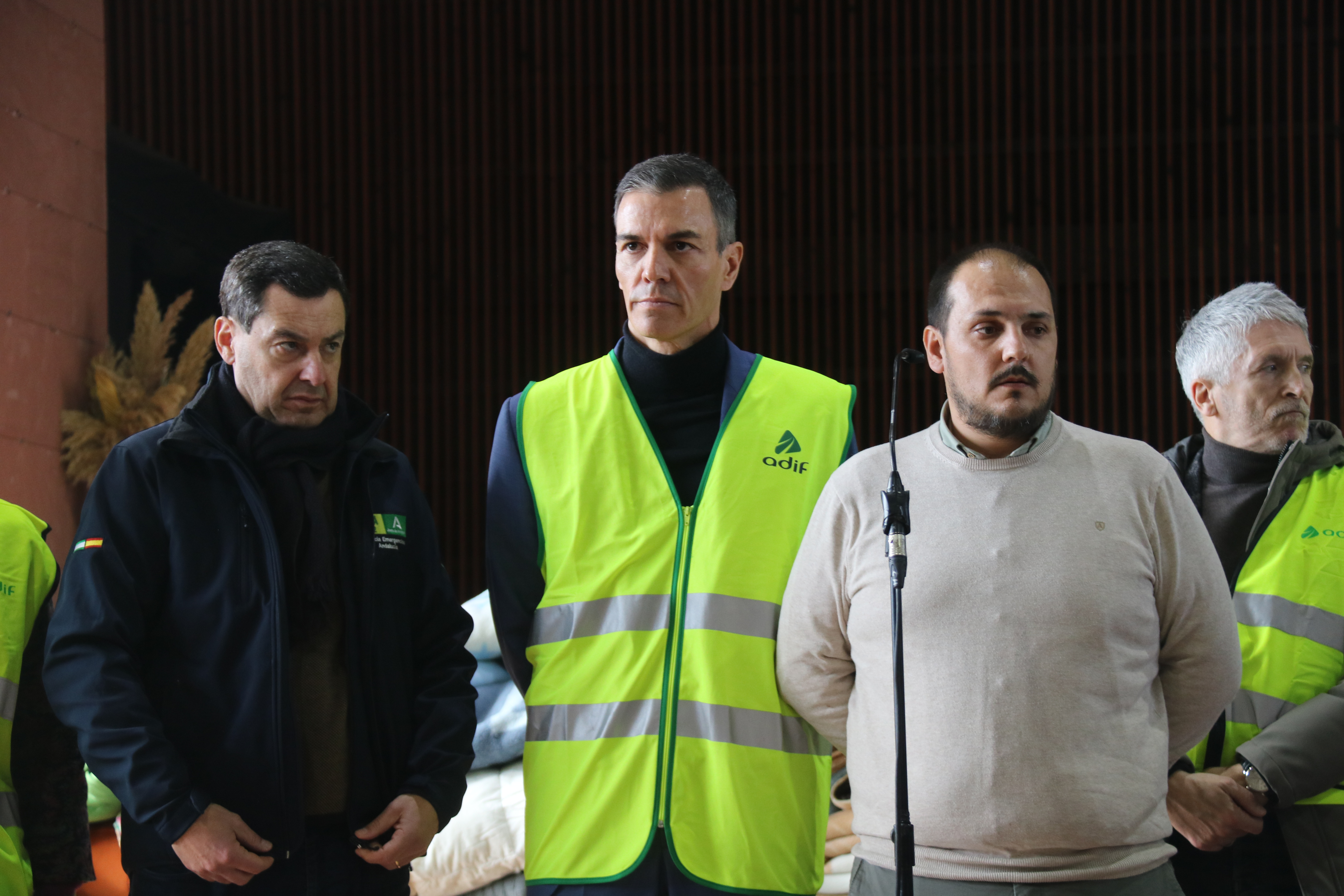 Spanish PM Pedro Sánchez in the center, accompanied by Juanna Moreno Bonilla, president of Andalusia, and Rafael Ángel Moreno, mayor of Adamuz, during a press conference after a train crash near Córdoba