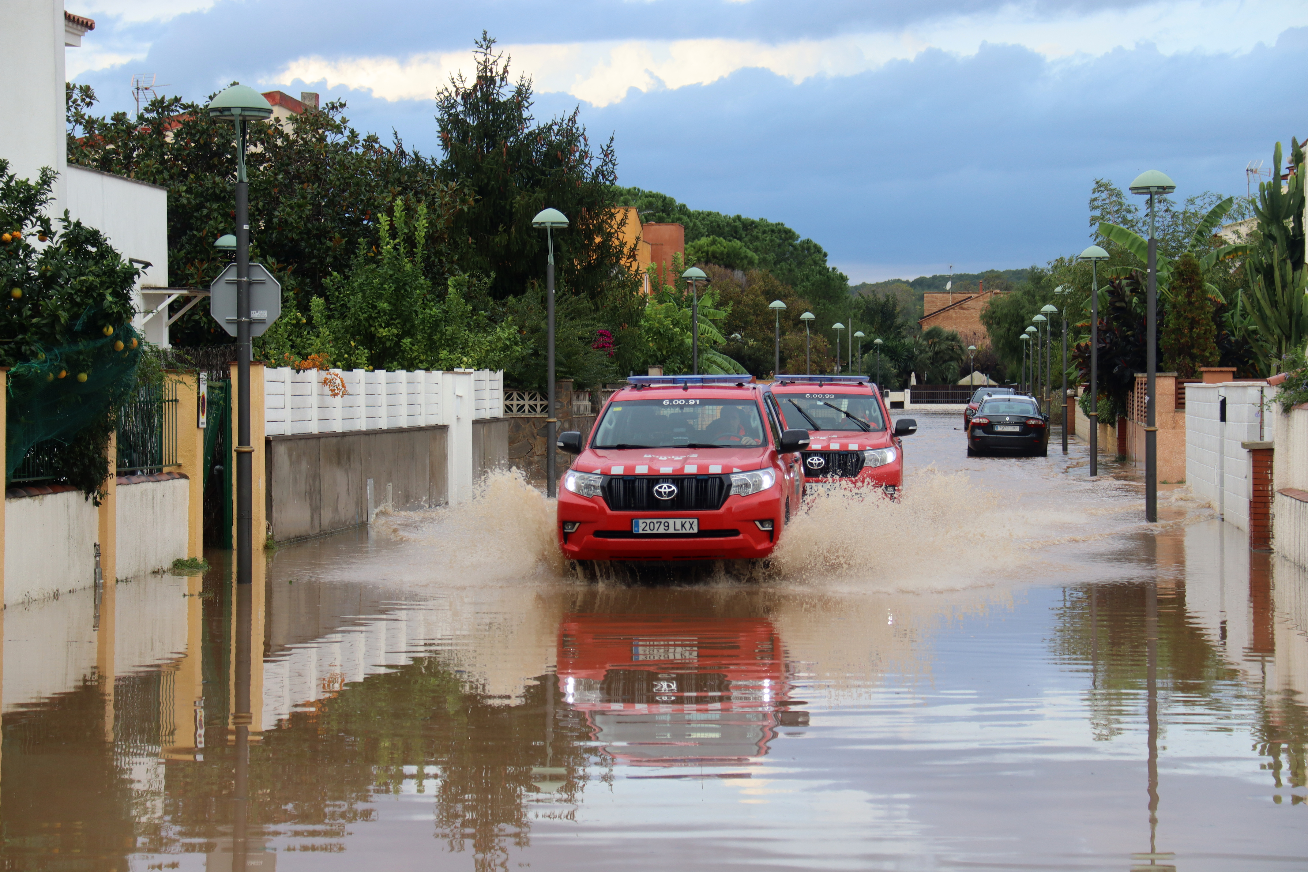 Catalan firefighters in a flooded street in Tarragona