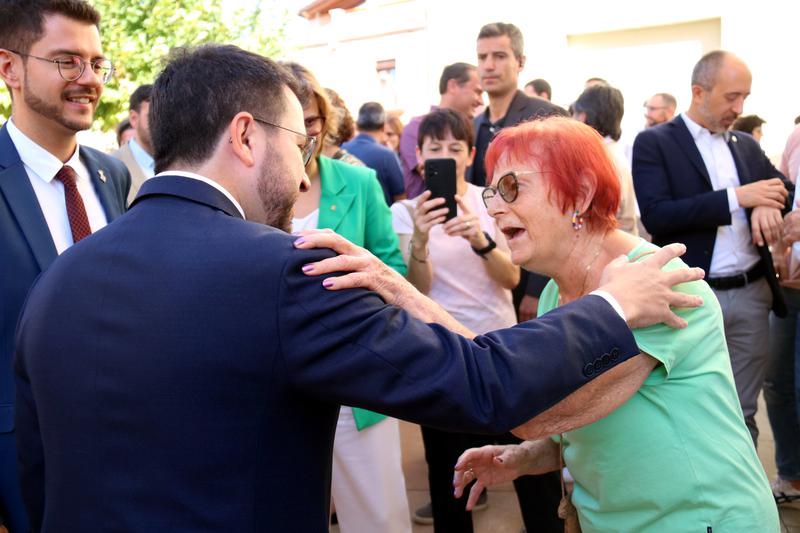 Catalan president Pere Aragonès meets a women whose wrist was broken by Spanish police officers on the day of the 2017 independence referendum
