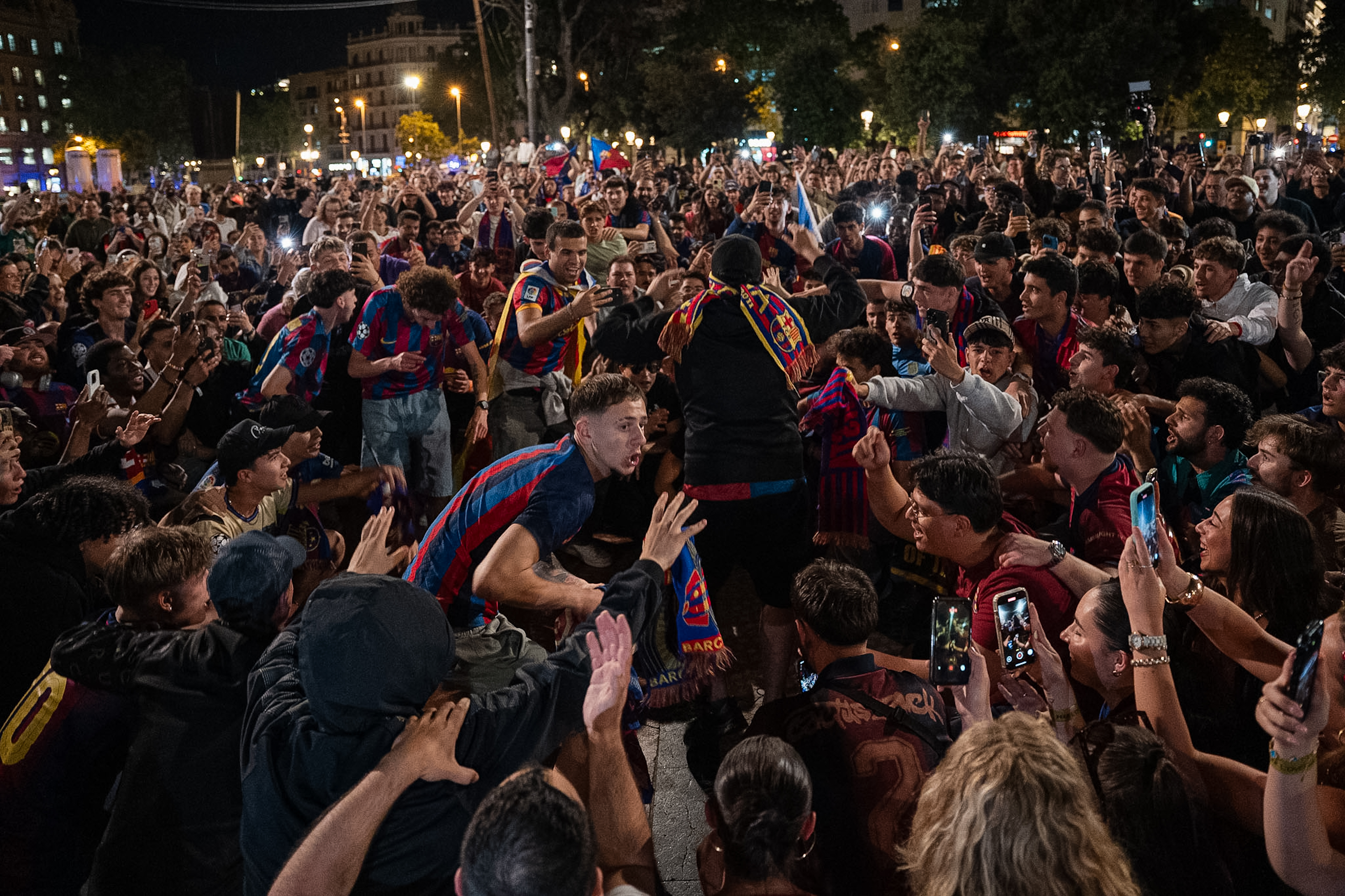 Barça fans celebrate the club’s 29th La Liga title at Plaça de Catalunya