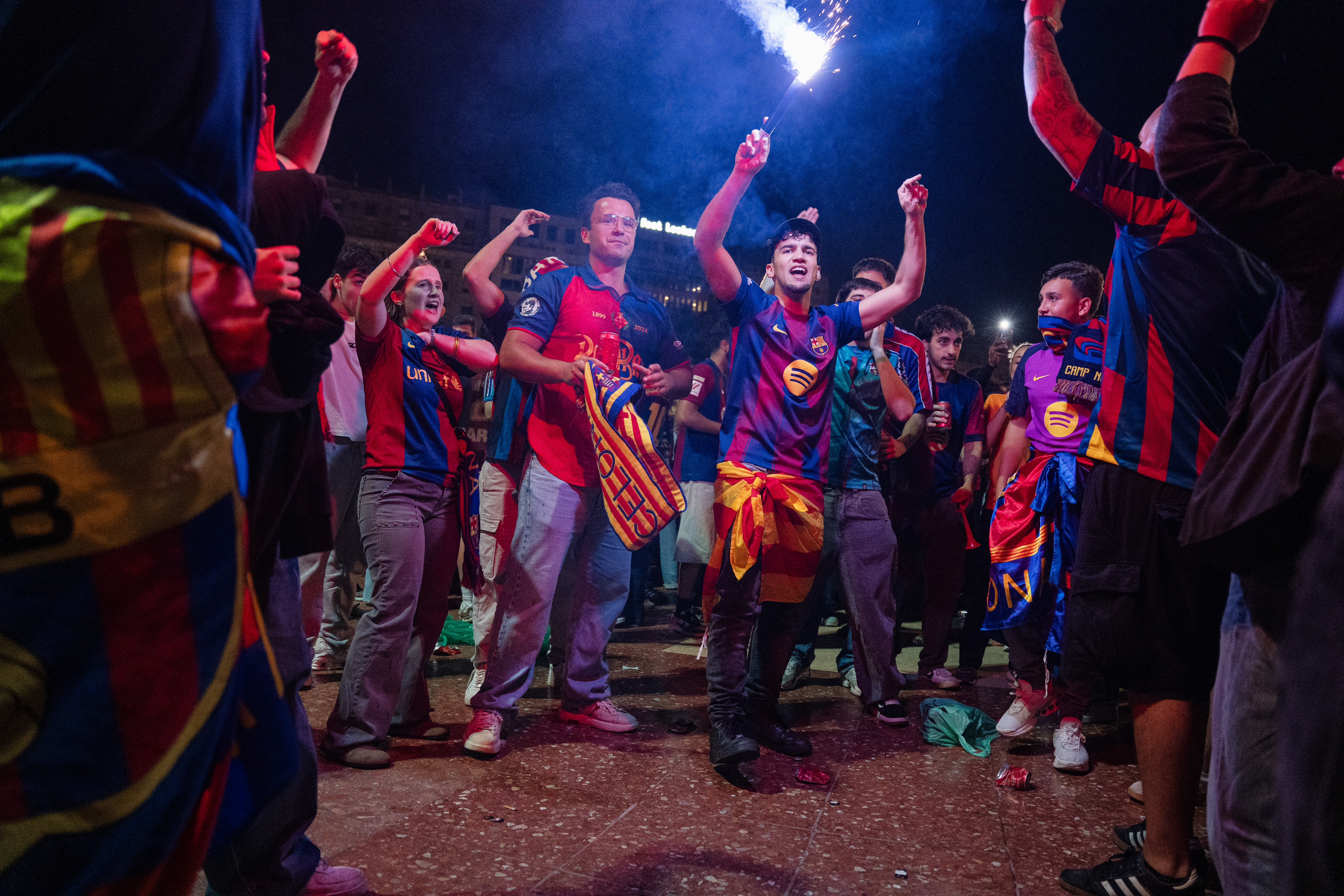 Barça fans celebrate the club’s 29th La Liga title at Plaça de Catalunya