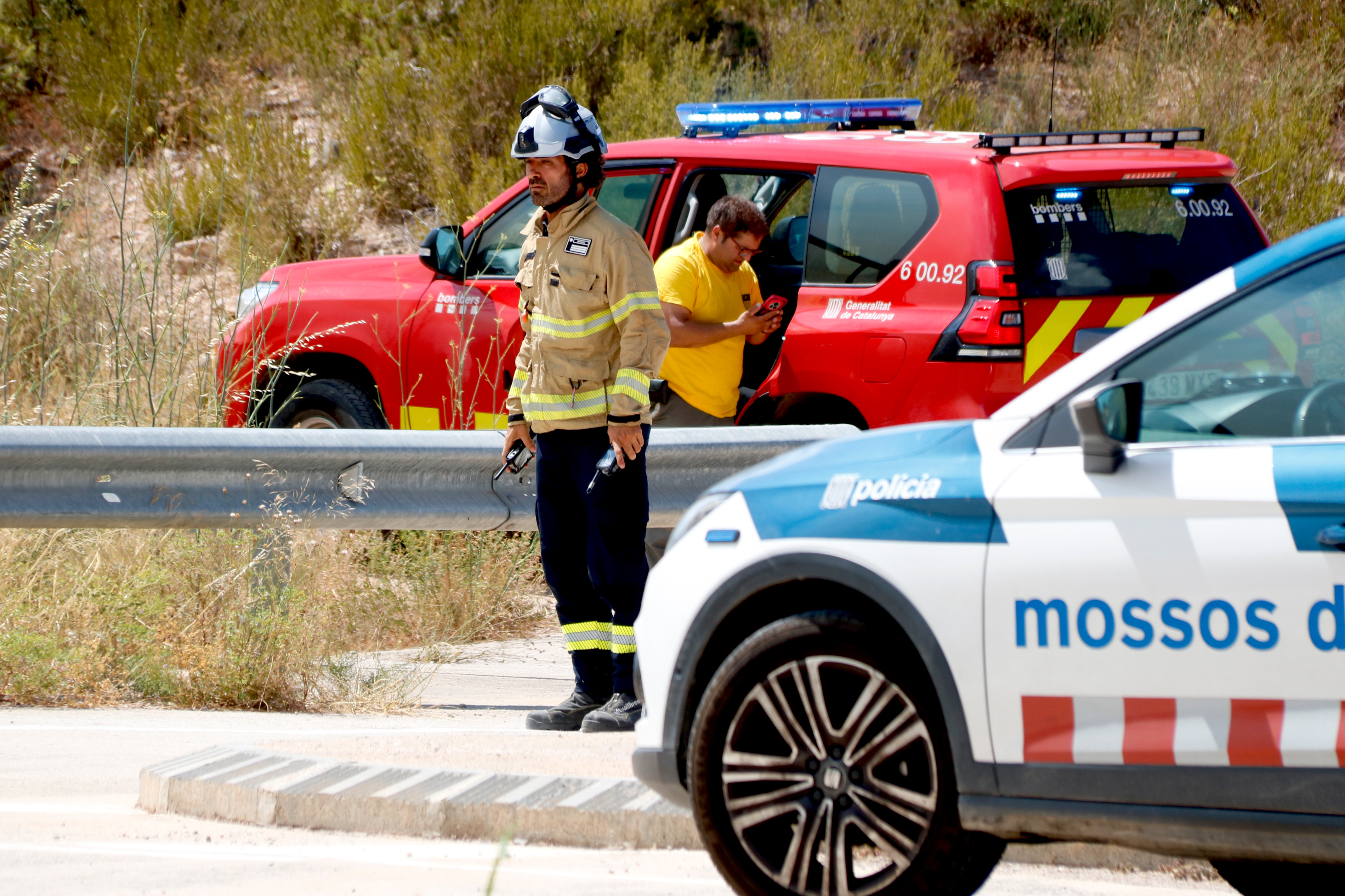 One of the firefighters working at the Paüls wildfire during the first hours of the blaze on July 7, 2025