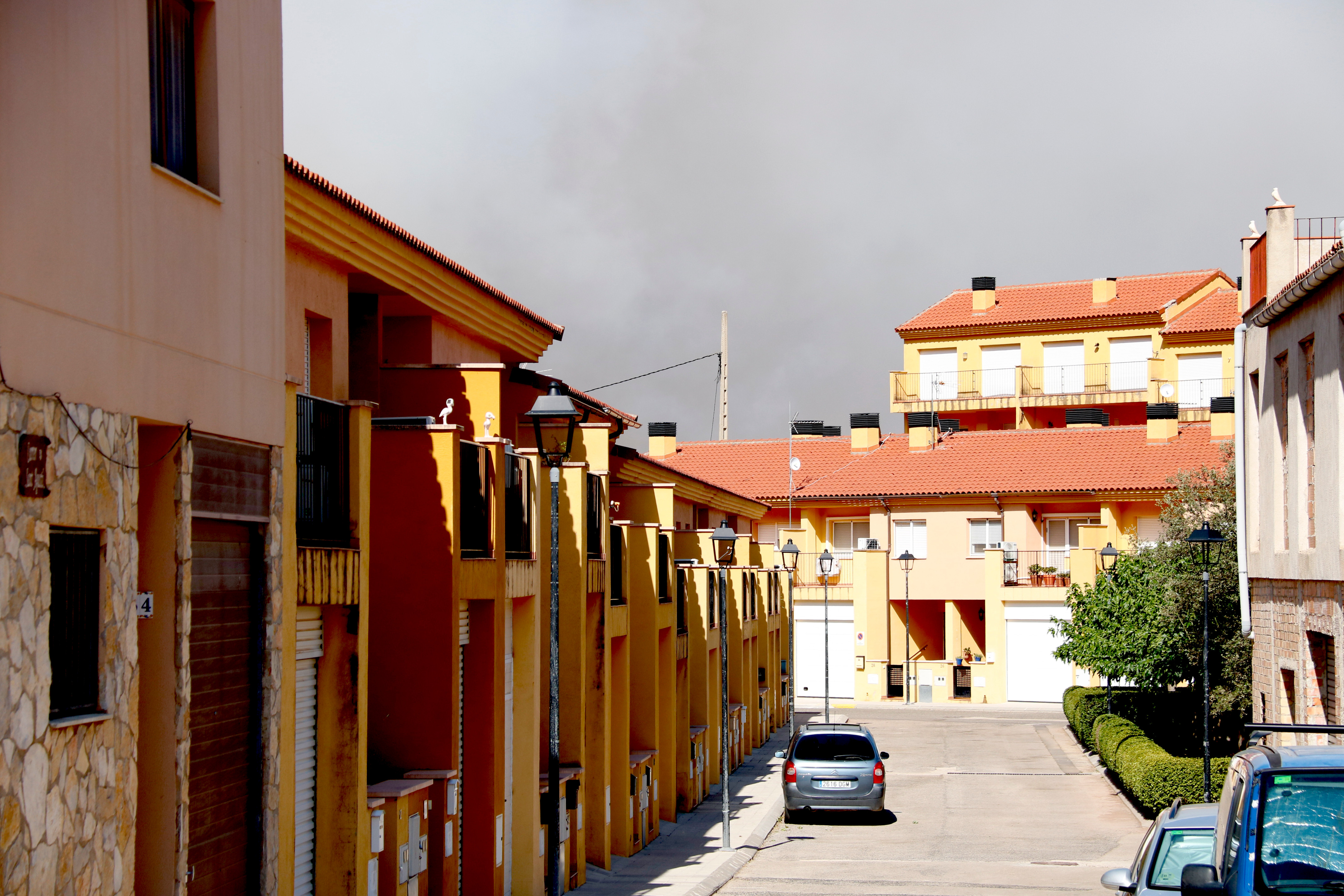 Smoke covers Alfara de Carles, one of the towns under lockdown