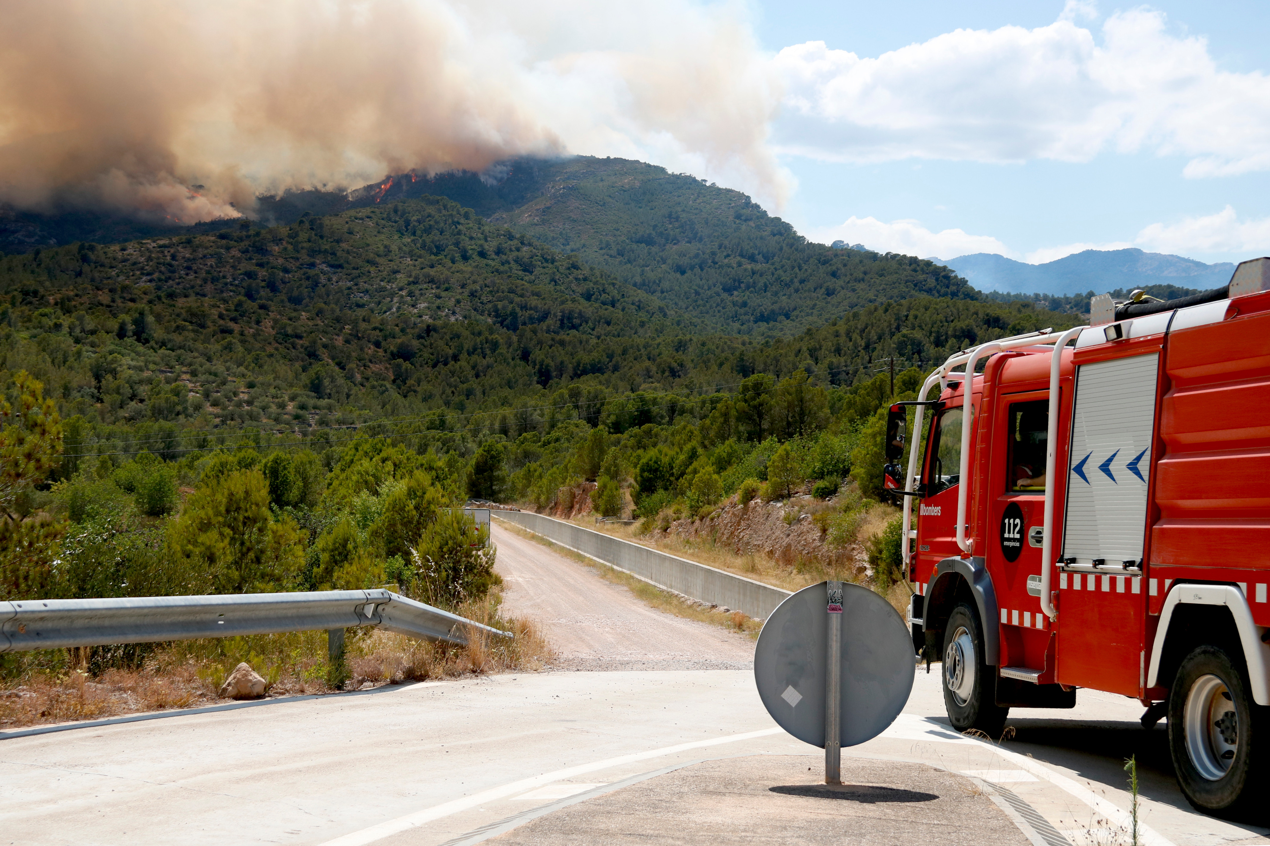 Firefighters working on the wildfire in southern Catalonia