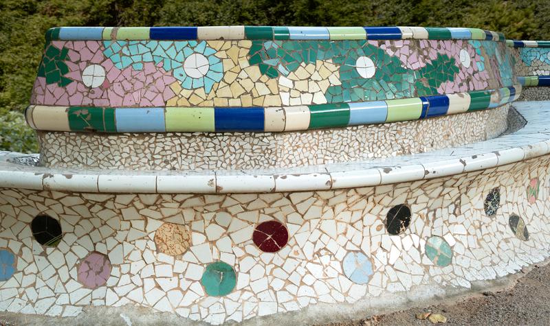 Benches with the 'trencadís' broken-tile mosaic in the garden of the old Sant Boi psychiatric hospital, similar to those in Park Güell.