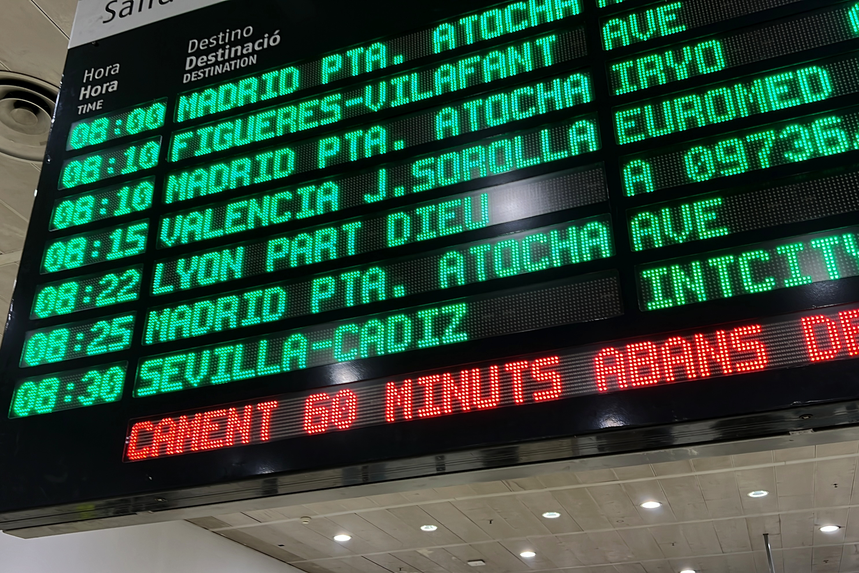 A sign in Barcelona Sants train station reads Lyon Part Dieu departing time at 8:22 am on July 23, 2023