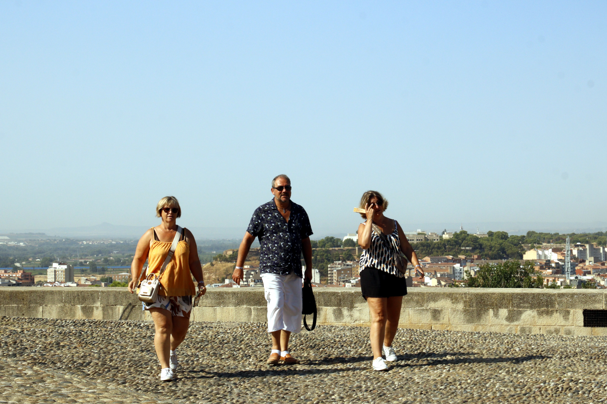 Three French tourists on the Seu Vella hill in Lleida