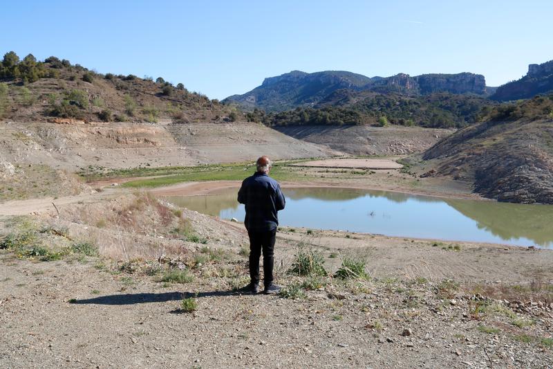Santi Borràs, from the Canoa Kayac company in Siurana, looks out at the Siurana reservoir which has only 7% of its total capacity of water
