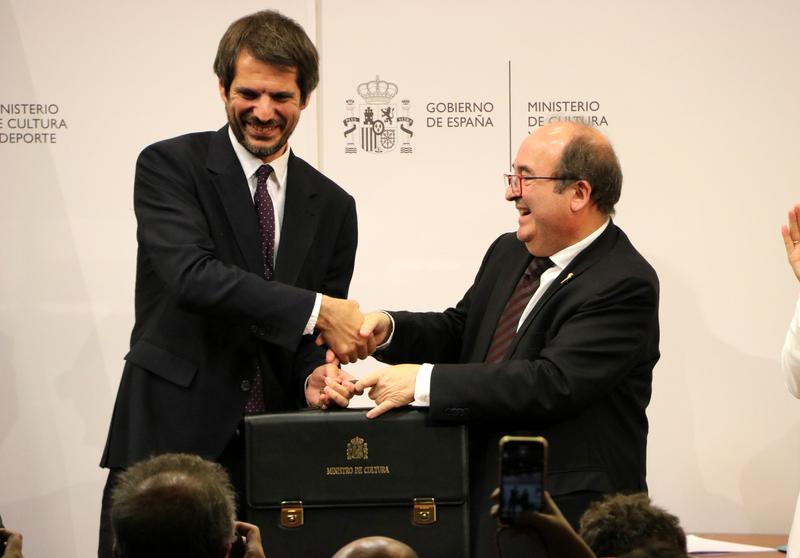 Outgoing Spanish culture minister Miquel Iceta hands over the department portfolio to the incoming head Ernest Urtasun
