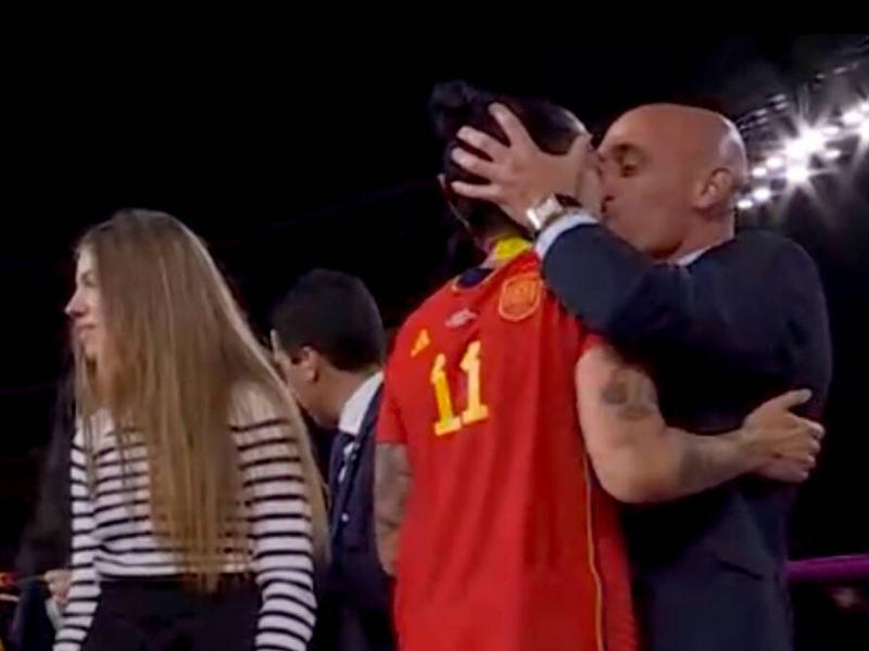 A screenshot from the television broadcast of the non-consensual kiss from Spanish football federation president Luis Rubiales on Jenni Hermoso