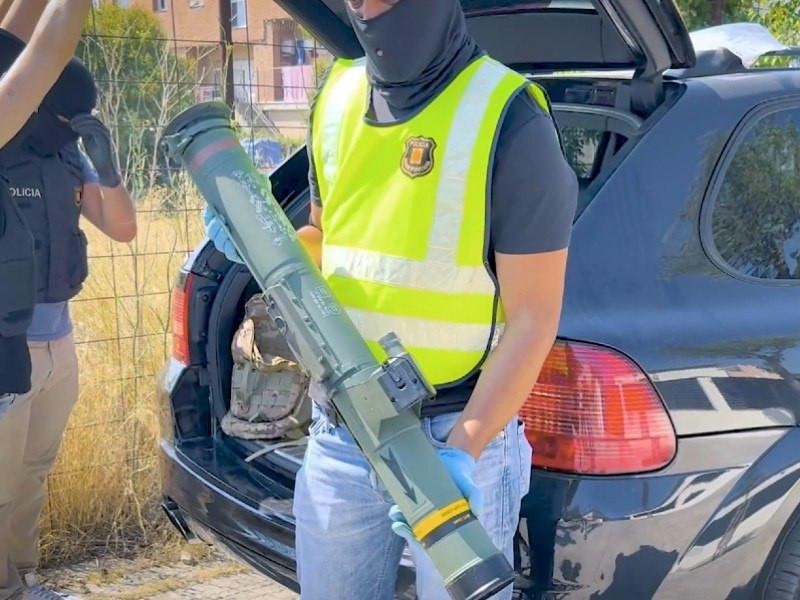 An agent with a confiscated rocket launcher.