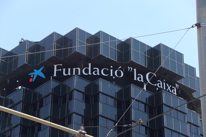 The ‘La Caixa Foundation’ logo on top of the CaixaBank main offices in Barcelona’s Diagonal Avenue