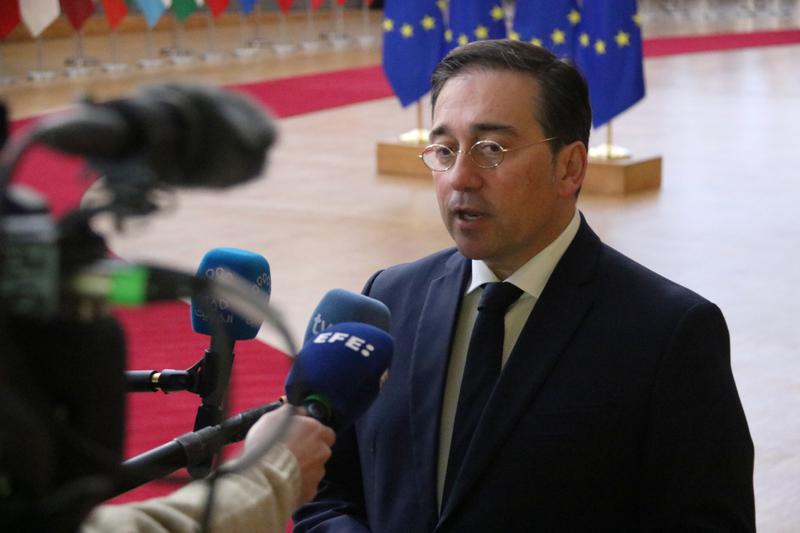 Spain's foreign affairs minister José Manuel Albares speaks to media outlets in Brussels in December 2024