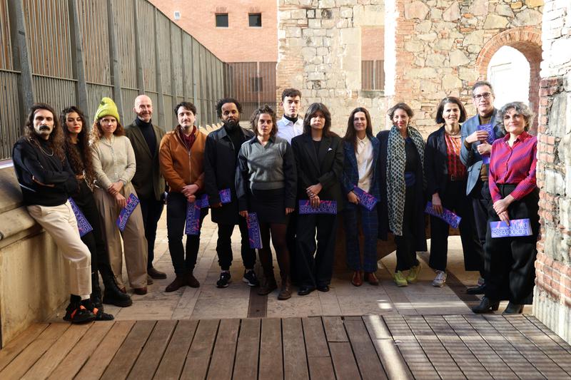 Photograph of aritsts involved in the 'Micro Operas of Today' project, alongside officials from CCCB, MACBA, and Liceu