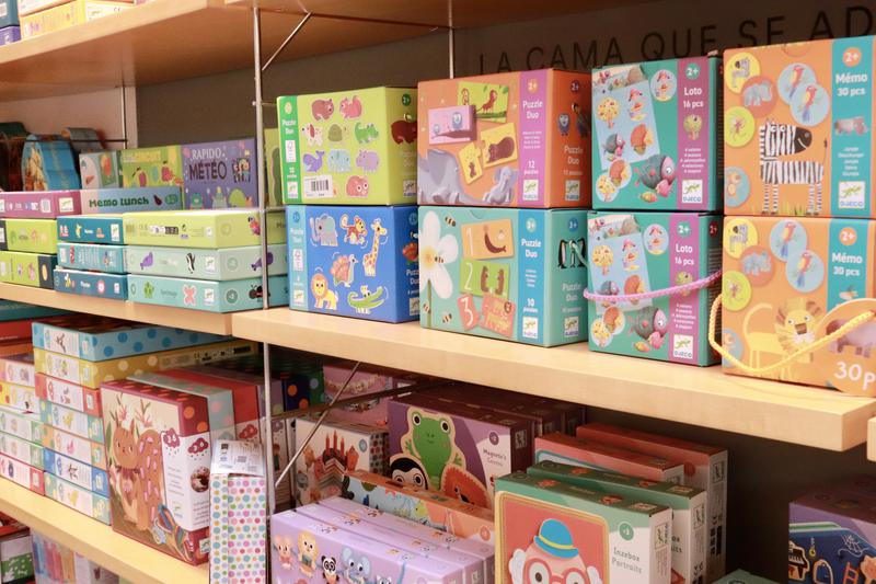 Puzzles and board games on display in a toy store in Terrassa