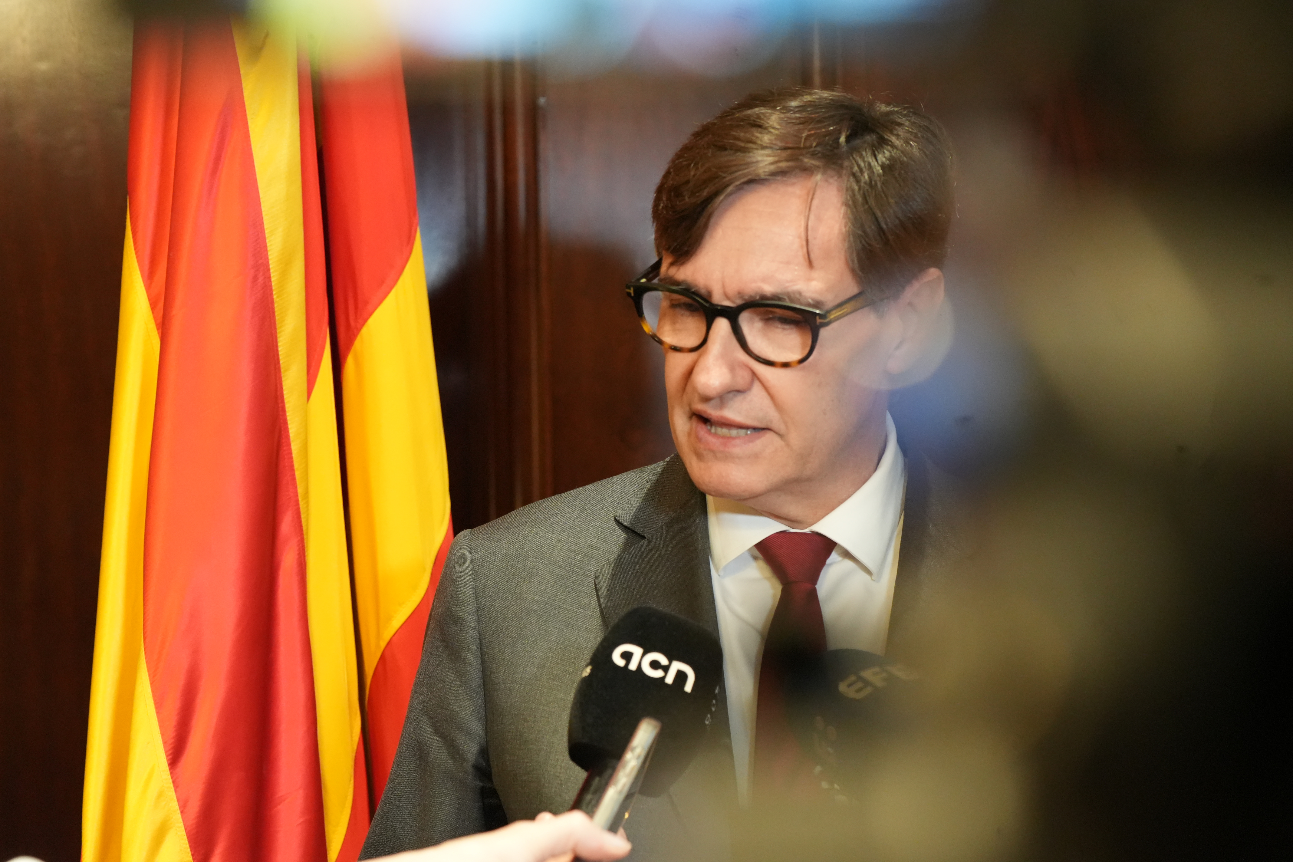 Catalan President Salvador Illa reacts after Parliament approves the budget
