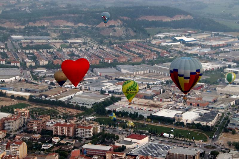 Hot air balloons flying over Igualada during the 2023 European Balloon Festival