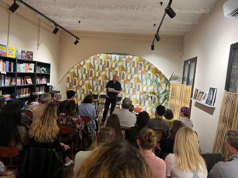 Image of people gathered for a book club event at Backstory Bookshop