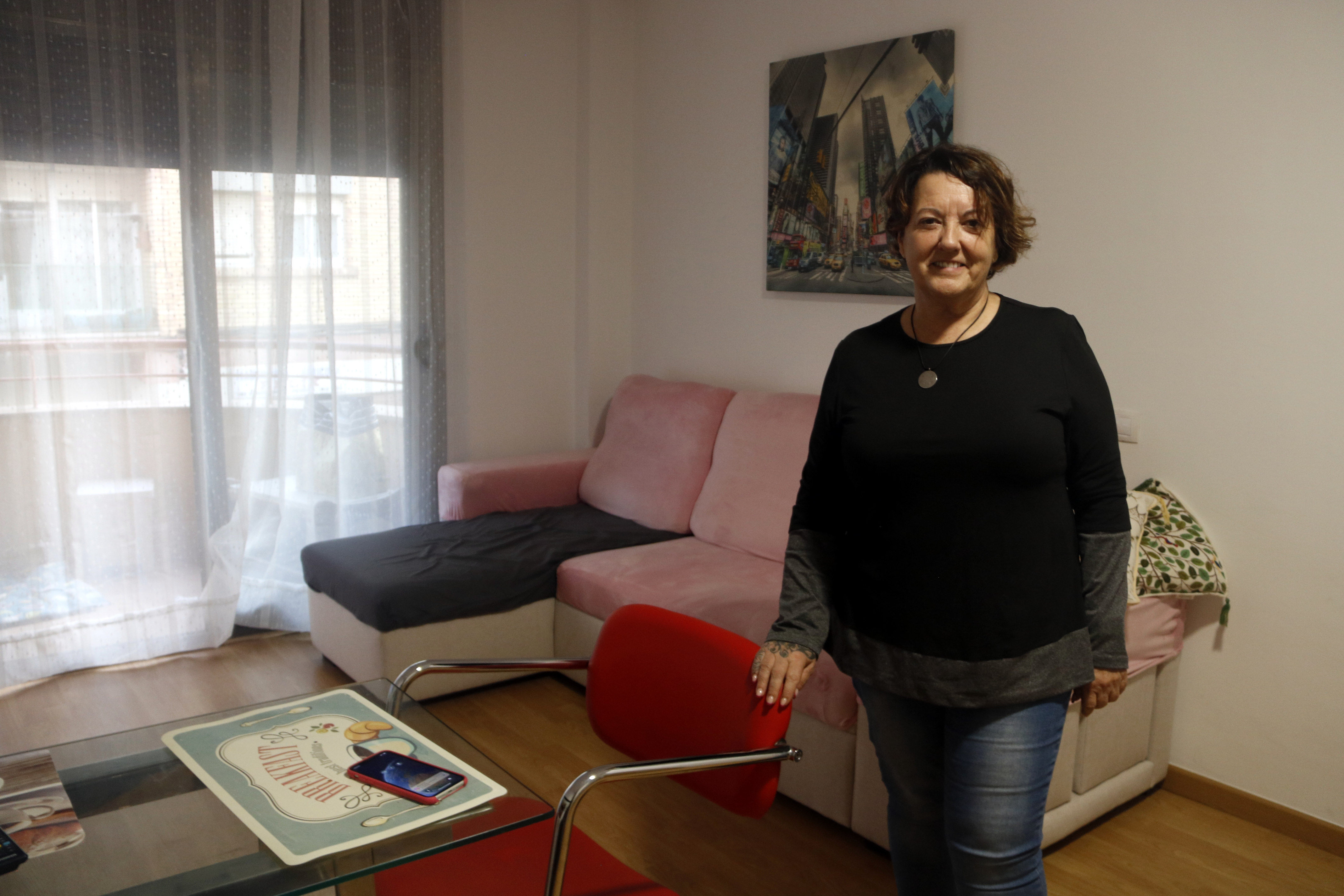 Maria Lluïsa, member of la Voliana in Lleida, in her apartment