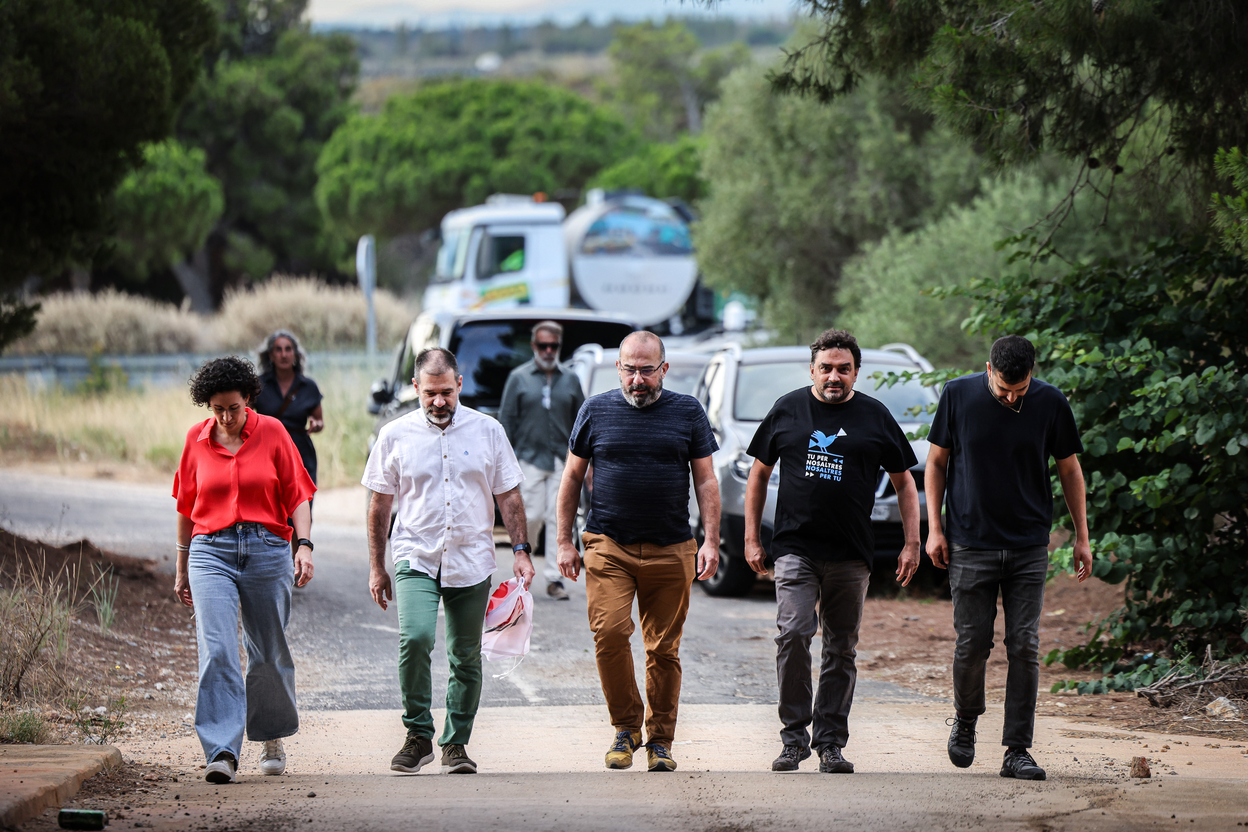 The pro-independence figures walking in Salses, Northern Catalonia, just before crossing the French-Spanish border during their return to Catalonia from Switzerland on July 12, 2024