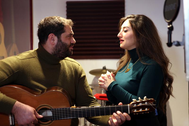 Aseel Massoud and Ahmad Dyab in their music studio