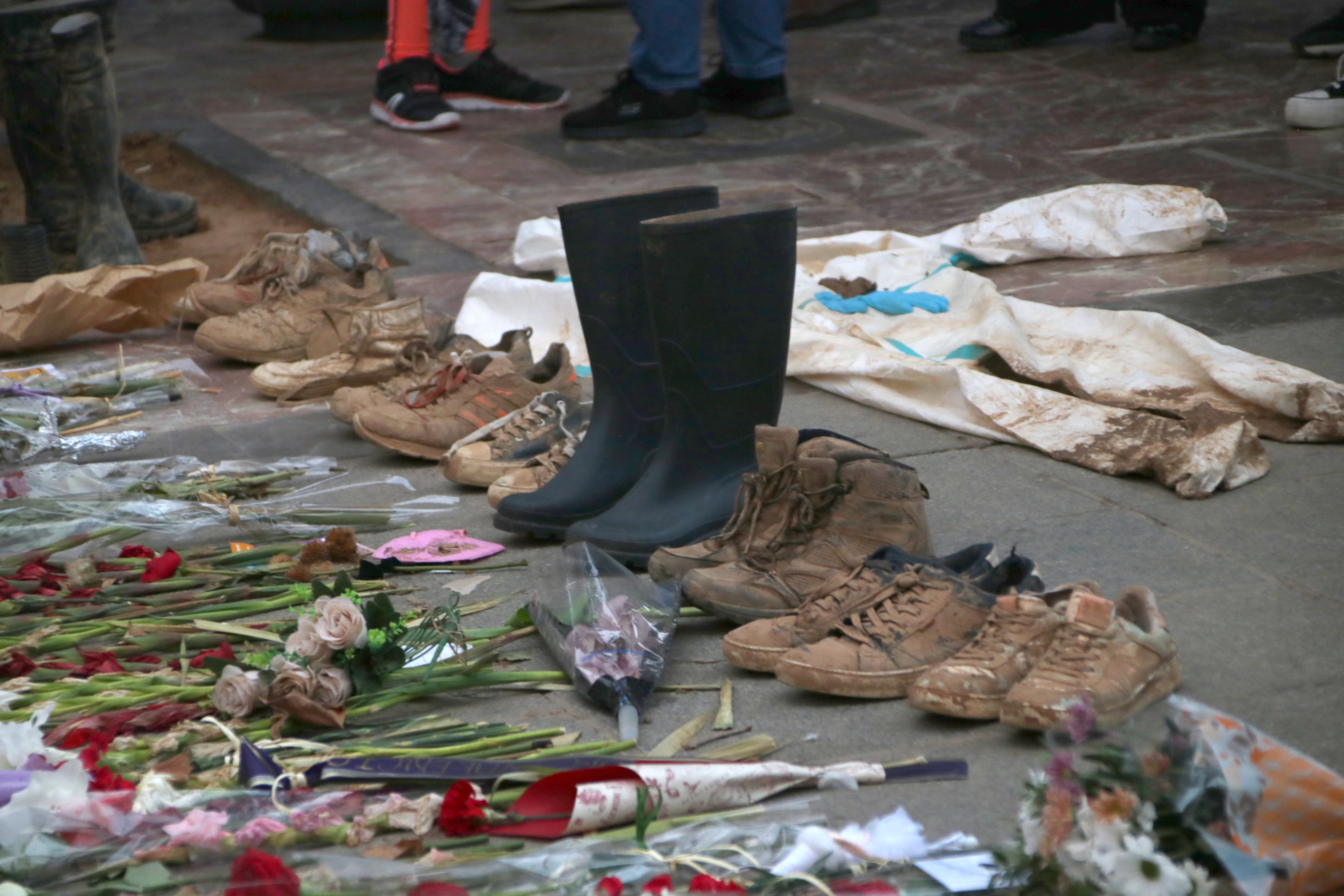 Shoes and boots with mud after the Valencia floods take part in the demonstration on November 9, 2024